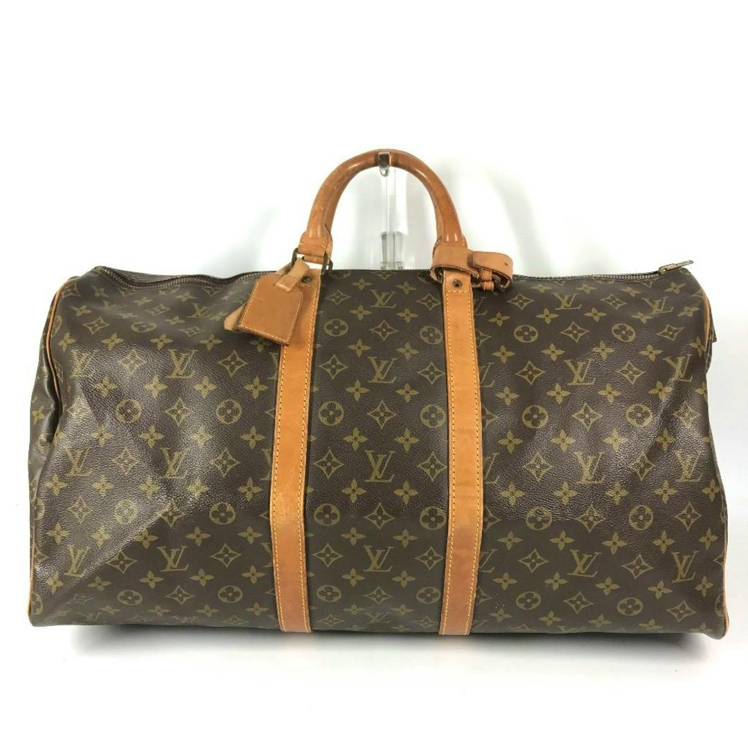 Front view of the Louis Vuitton Monogram canvas Keepall 55 travel bag with brown leather straps and handles.