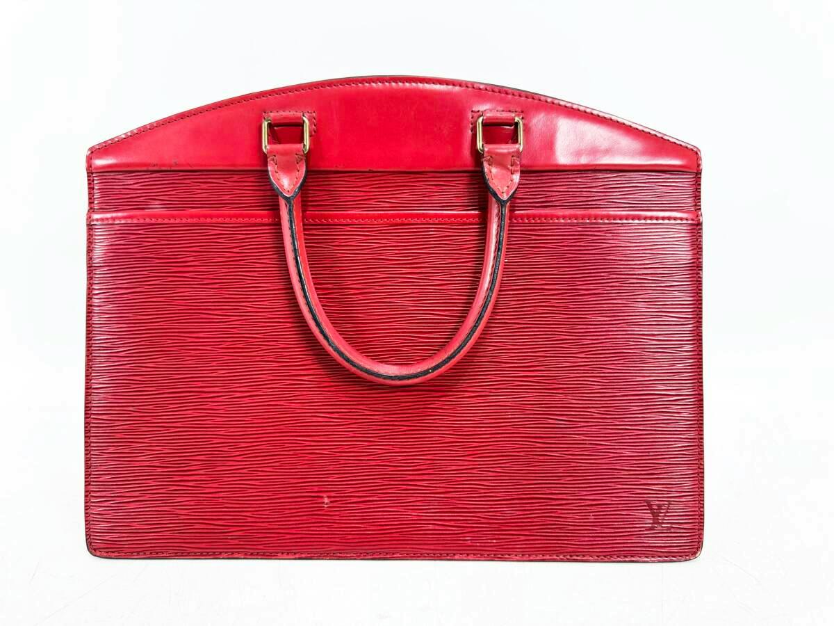 Front view of the Castilian red Louis Vuitton Epi Rivièra tote handbag showing textured leather, top handles, and an LV logo at the lower right.