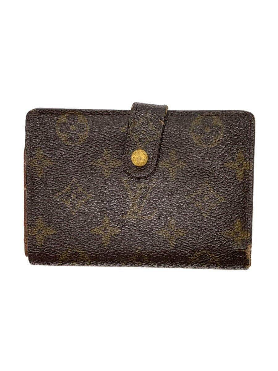 Closed brown Louis Vuitton monogram wallet with a snap tab visible.