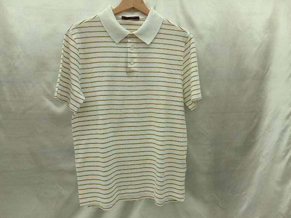 White Louis Vuitton men's cotton polo shirt with horizontal yellow stripes hanging on a hanger.
