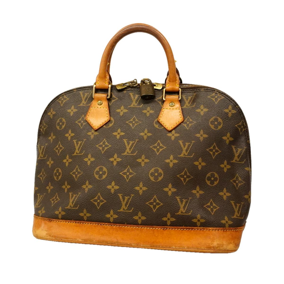 Front view of the brown Louis Vuitton Monogram Alma M51130 handbag showing monogram canvas, leather trim, handles, and a padlock.
