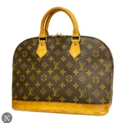 Front view of a brown Louis Vuitton Monogram Alma handbag (M51130) with double rolled handles and a leather base.