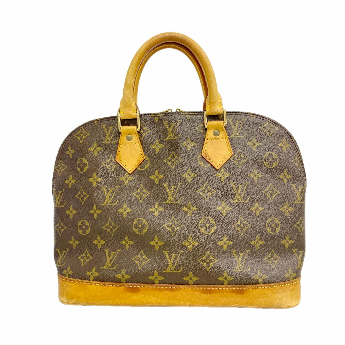 Front view of a Louis Vuitton Monogram Alma handbag (M51130) in brown with leather handles and trim.