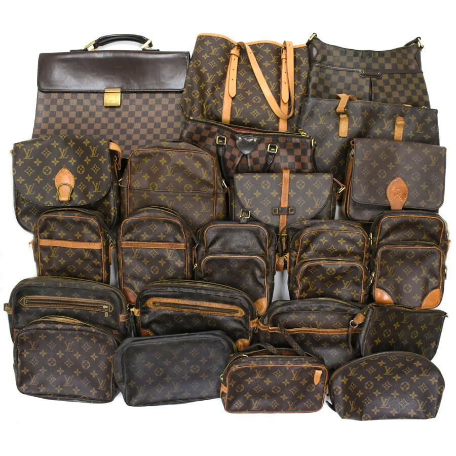 Group of Louis Vuitton monogram and Damier patterned shoulder bags, handbags, and pouches arranged together.