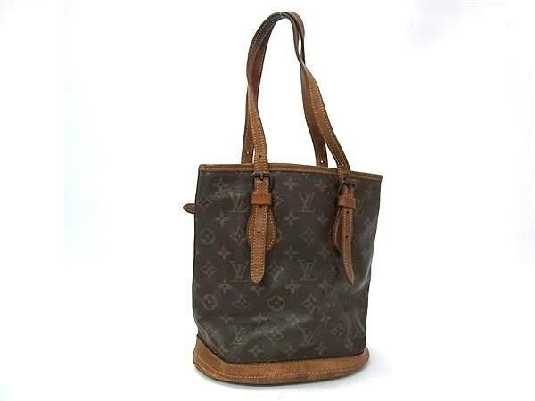 Louis Vuitton Monogram Bucket PM canvas bucket-style handbag with leather trim and shoulder straps on a white background.
