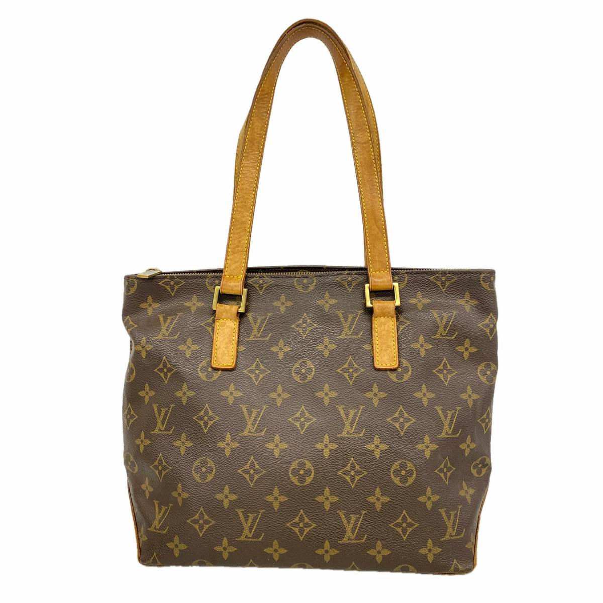 Front view of a brown Louis Vuitton monogram canvas tote bag with long leather shoulder straps.