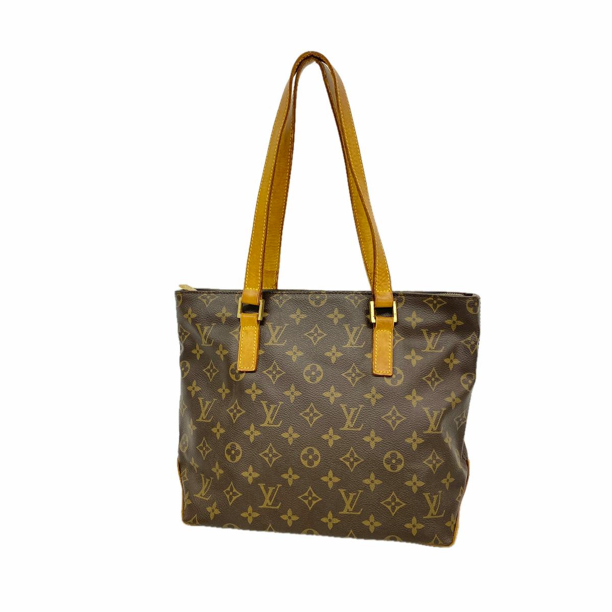 Front view of the brown Louis Vuitton monogram tote bag with tan leather shoulder straps.