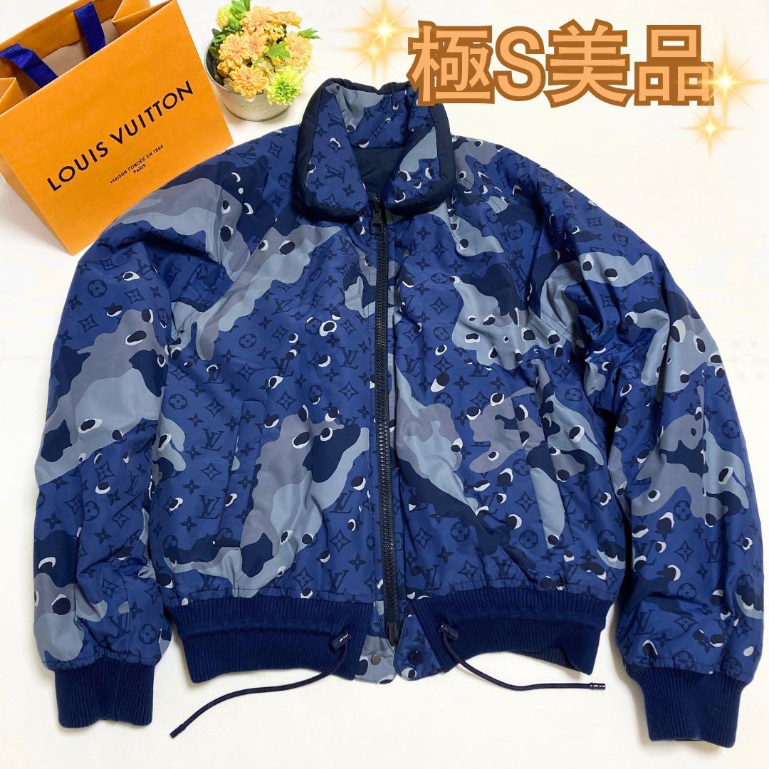 Front view of a blue Louis Vuitton monogram camouflage reversible men's jacket (size 48) laid flat on a white background.