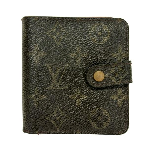 Front view of a Louis Vuitton monogram canvas bi-fold wallet with a snap-button strap closure.
