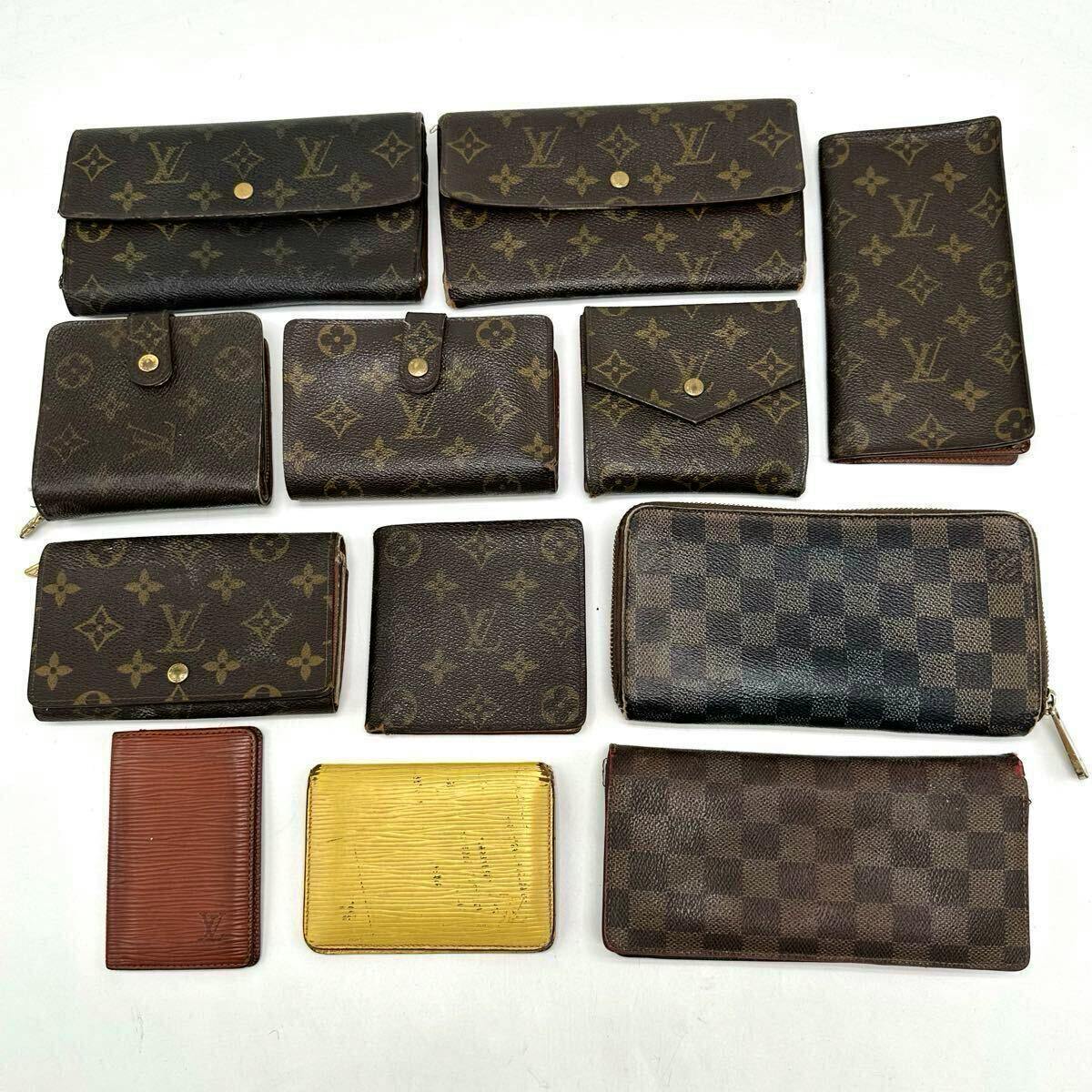 Twelve Louis Vuitton wallets and small leather goods in Monogram, Damier, and Epi patterns arranged on a white background.