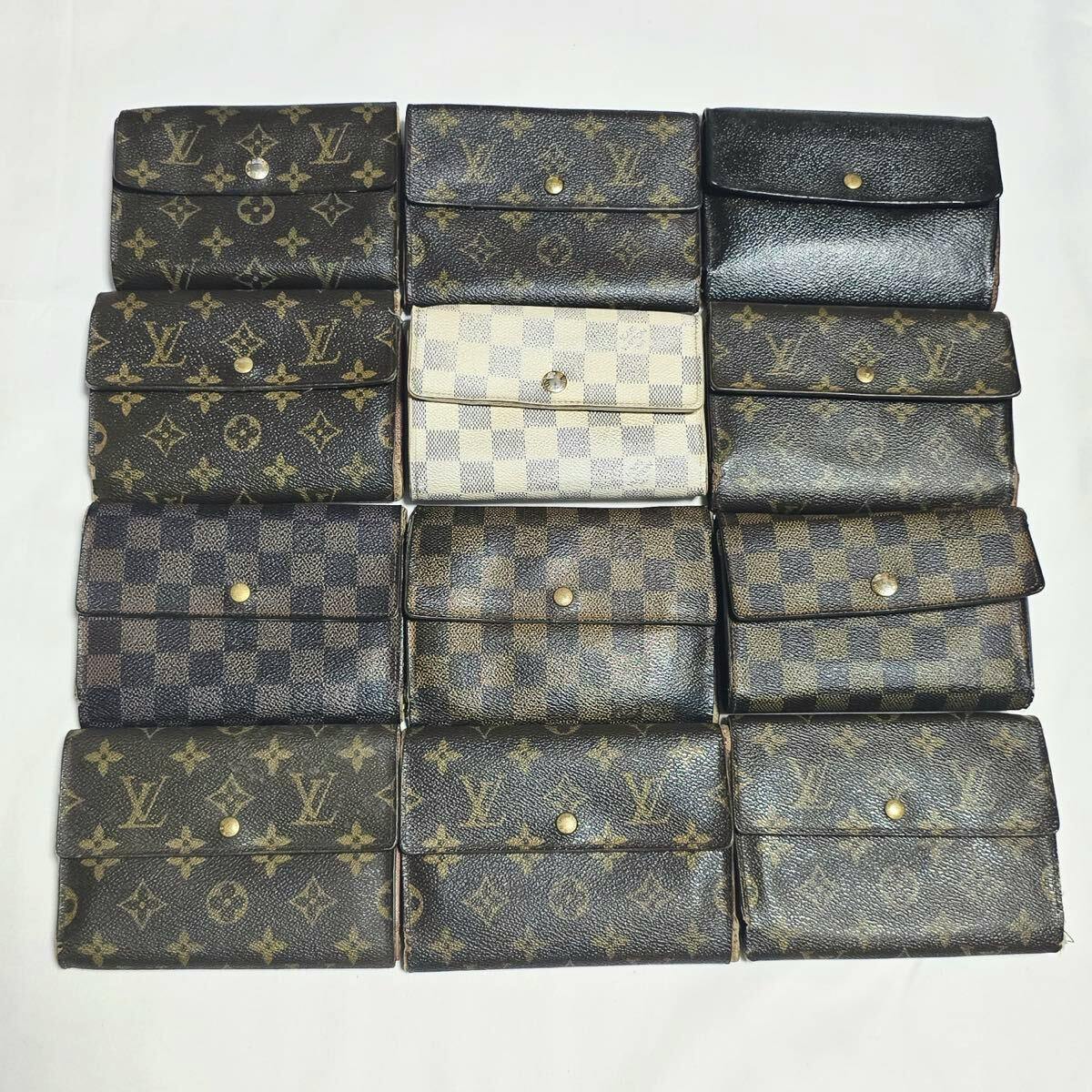 Twelve Louis Vuitton wallets in various monogram and Damier patterns arranged in a grid on a white background.