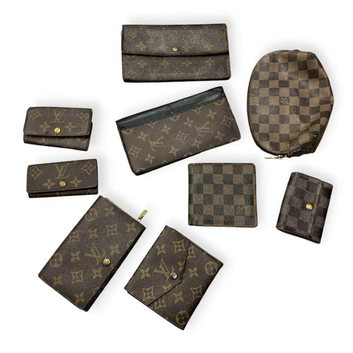 Several Louis Vuitton wallets and small leather goods in monogram and Damier patterns arranged on a white background.