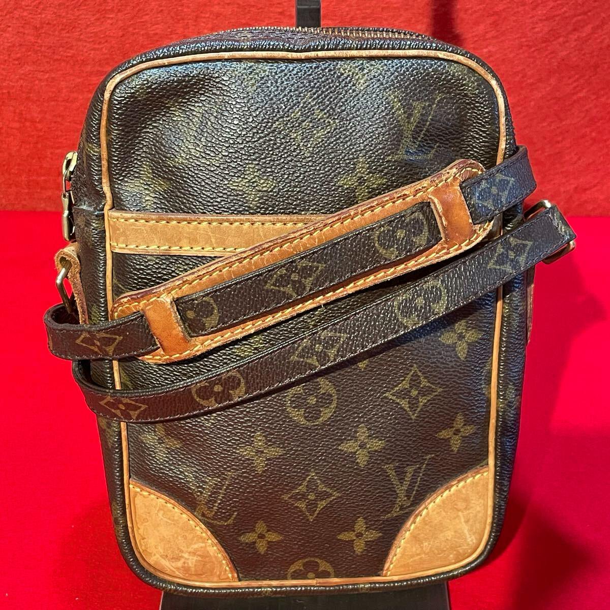 Front view of a Louis Vuitton brown monogram canvas Danube crossbody shoulder bag with leather trim and strap.
