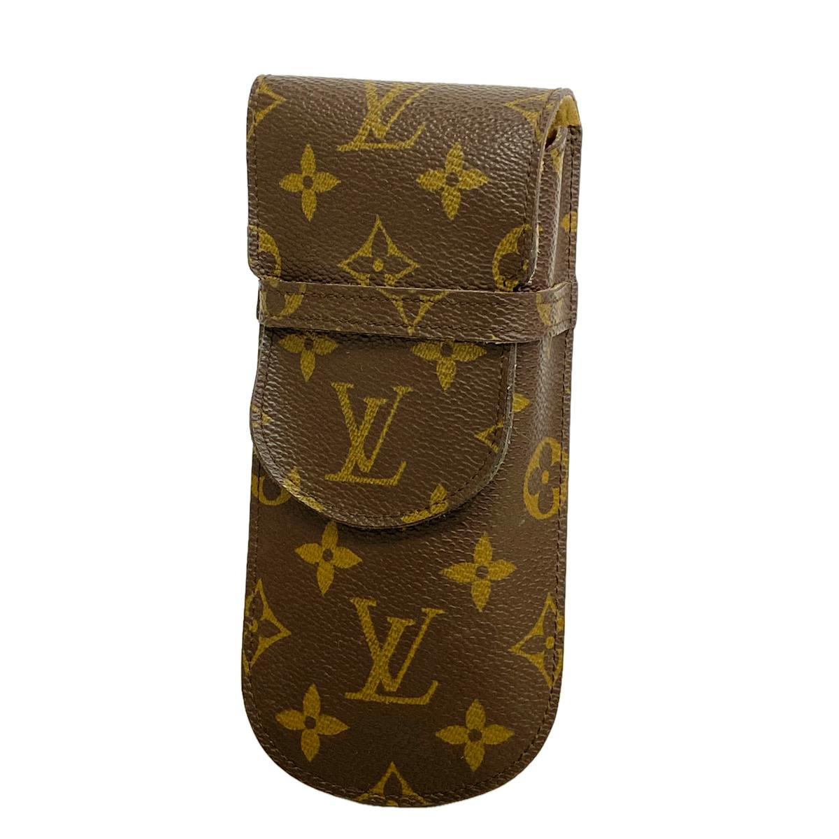 Closed brown Louis Vuitton monogram eyeglass case (étui lunettes) centered on a white background.