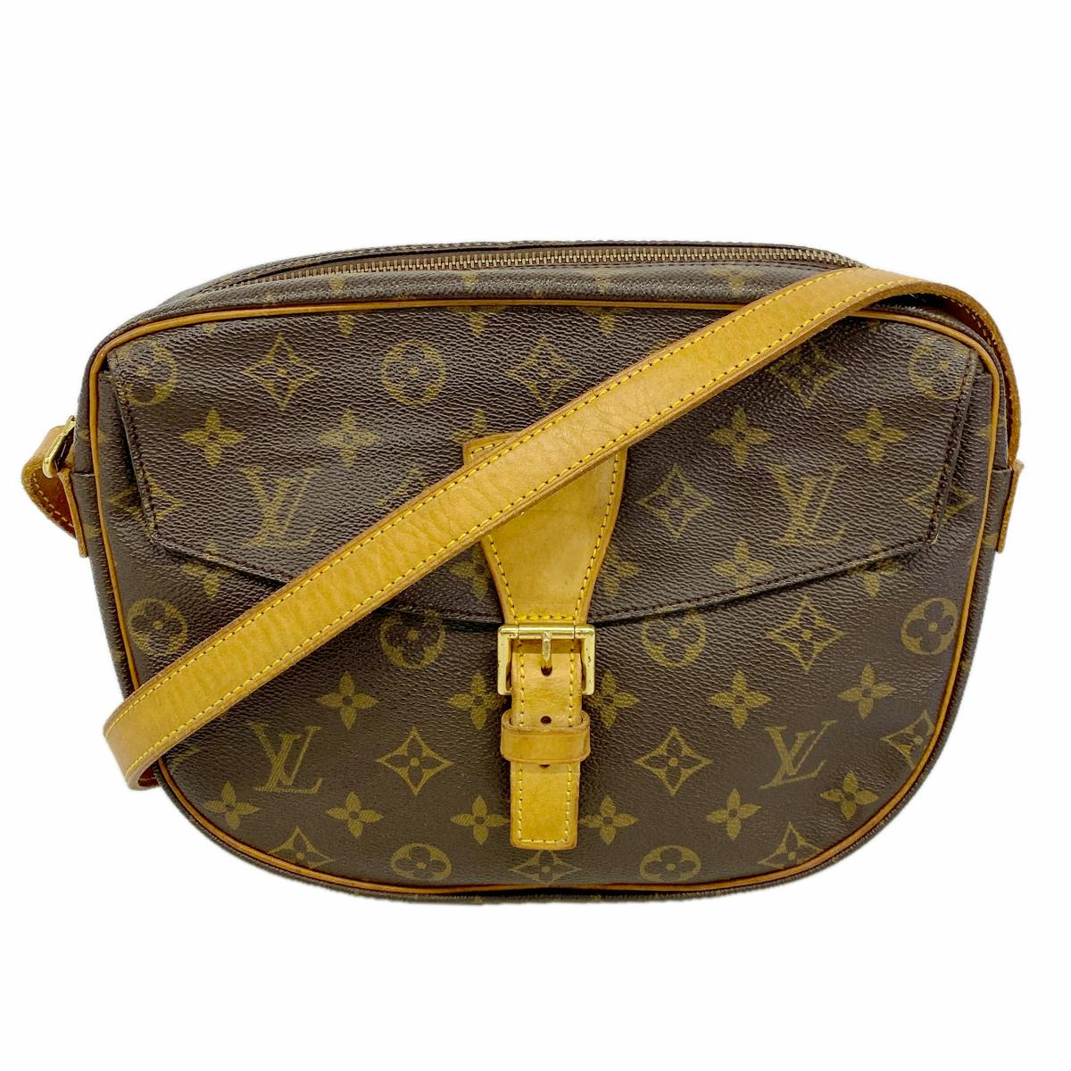 Front view of a brown Louis Vuitton monogram canvas shoulder bag with a leather strap and front buckle.