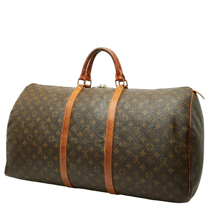 Brown Louis Vuitton monogram duffel bag with leather handles shown on a white background.