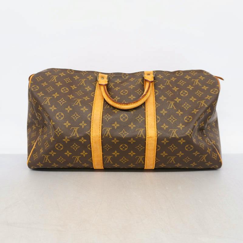 Brown monogram canvas Keepall 50 (M41426) duffel bag with tan leather handles and straps shown front-on on a neutral background.