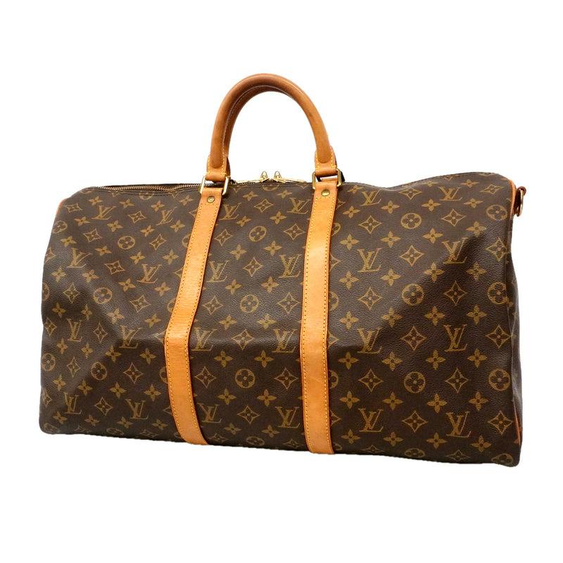 Brown monogram canvas Keepall 50 duffel bag with tan leather handles and straps.