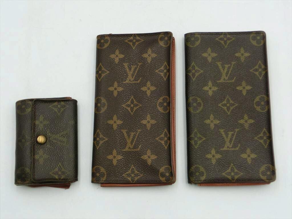 Three Louis Vuitton monogram pieces (two long wallets and one coin case) shown side-by-side on a white background.