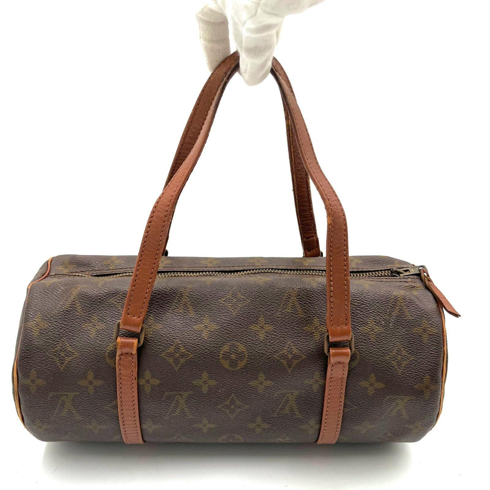 Front view of the LOUIS VUITTON Monogram Papillon30 mini Boston handbag showing monogram canvas, top zipper, and leather handles.