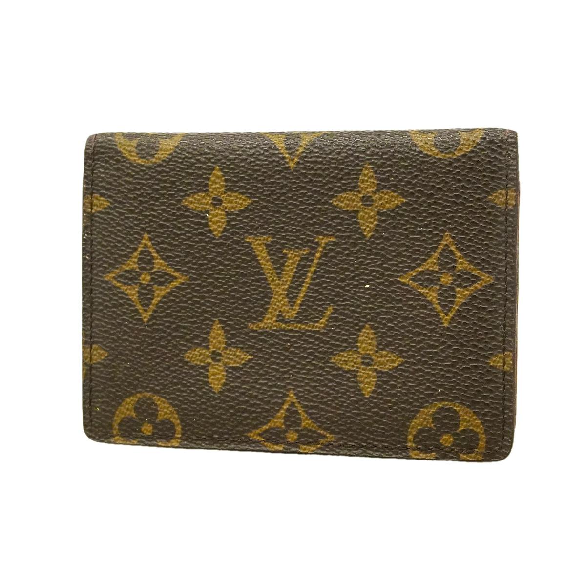 Front view of a brown Louis Vuitton monogram card case showing the LV pattern.