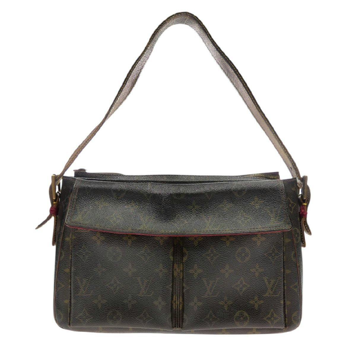 Front view of the brown Louis Vuitton monogram canvas shoulder bag with a single top strap and front flap.