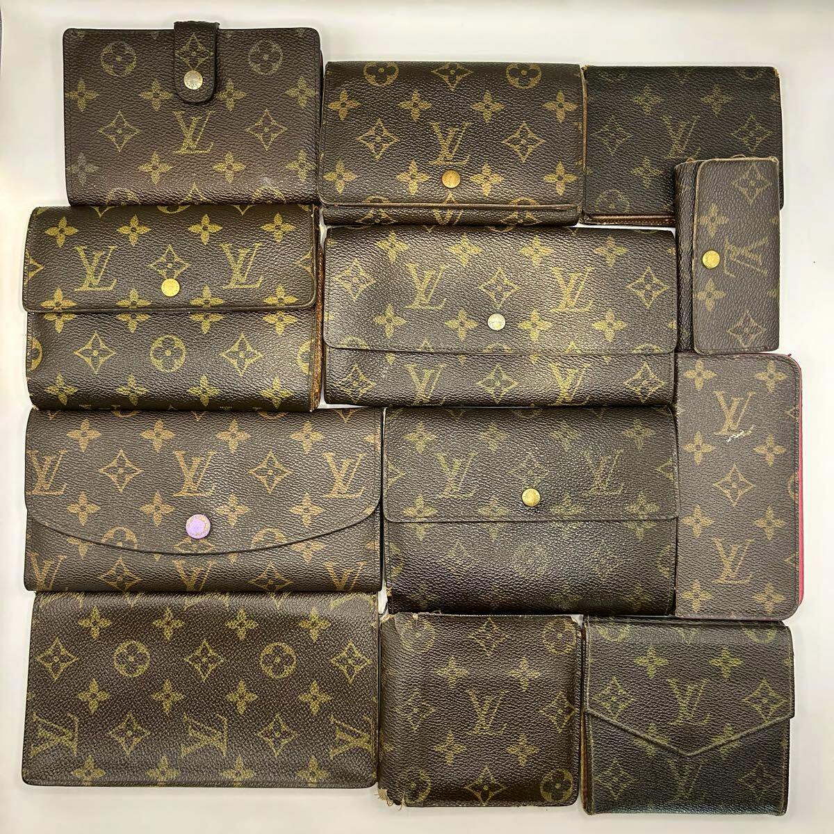 Several Louis Vuitton monogram wallets and key cases arranged in a grid on a light background.