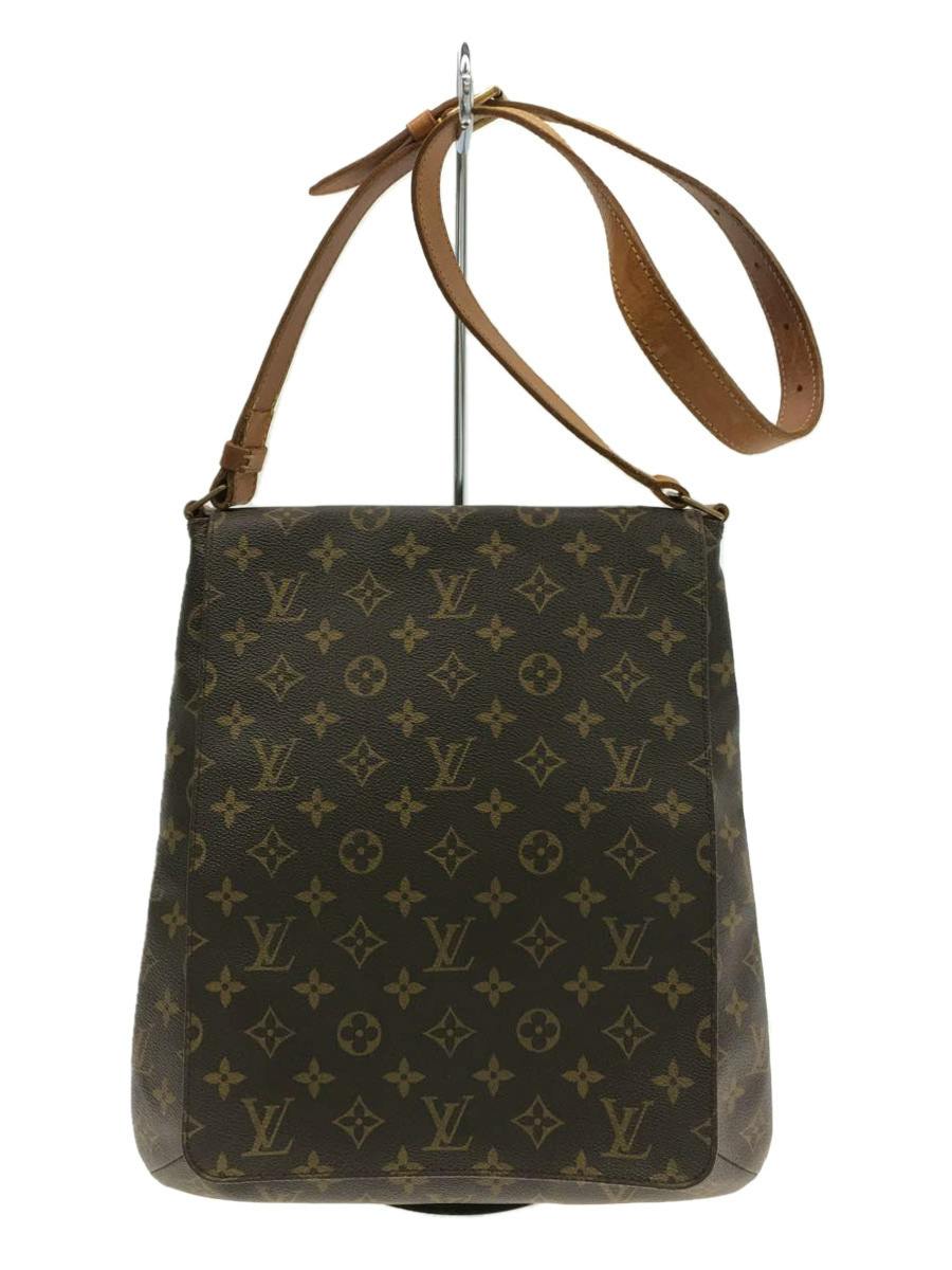 Front view of a Louis Vuitton monogram bag with a brown leather shoulder strap hanging on a display stand.