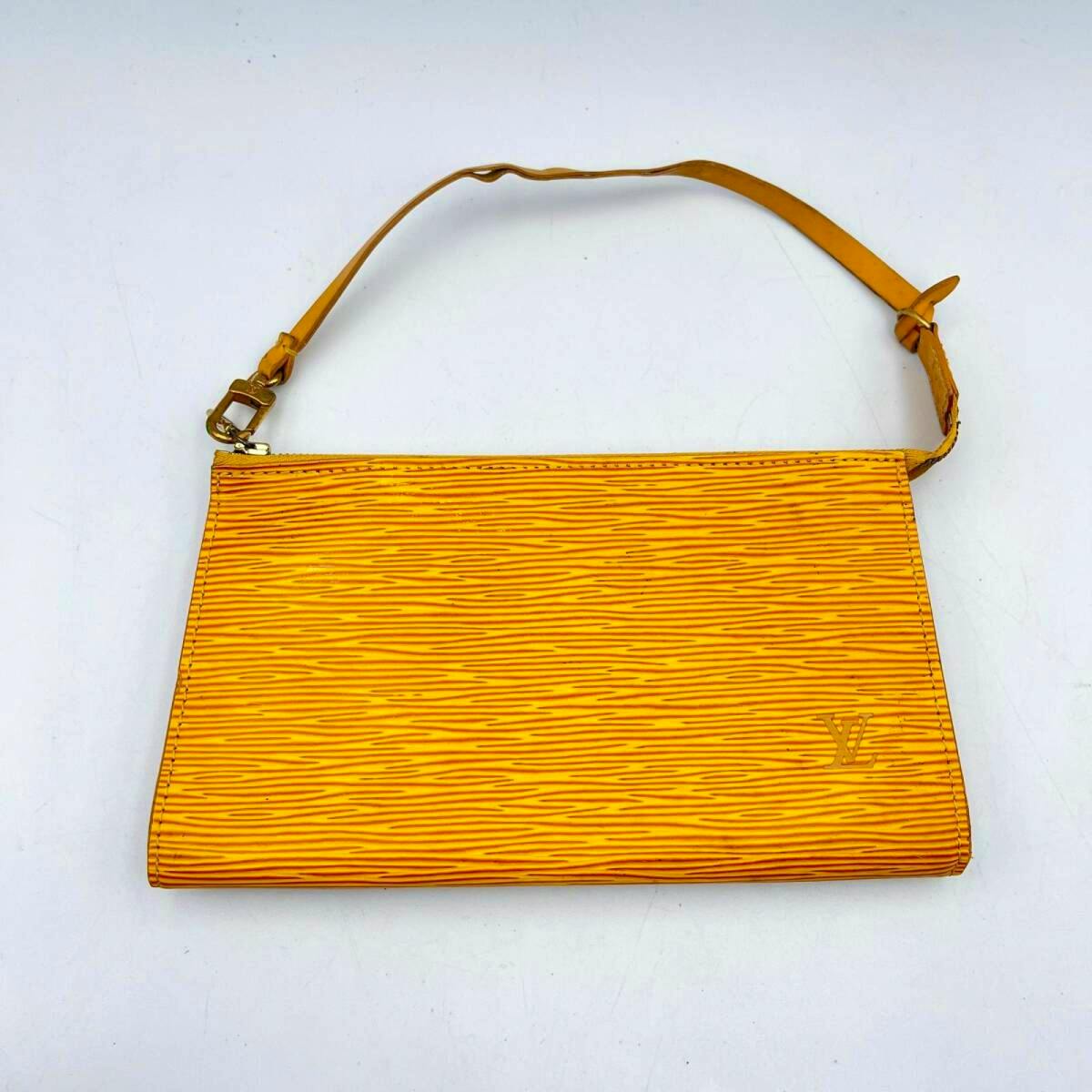 Yellow Epi leather Louis Vuitton pochette with wrist strap and visible LV logo on a white background.
