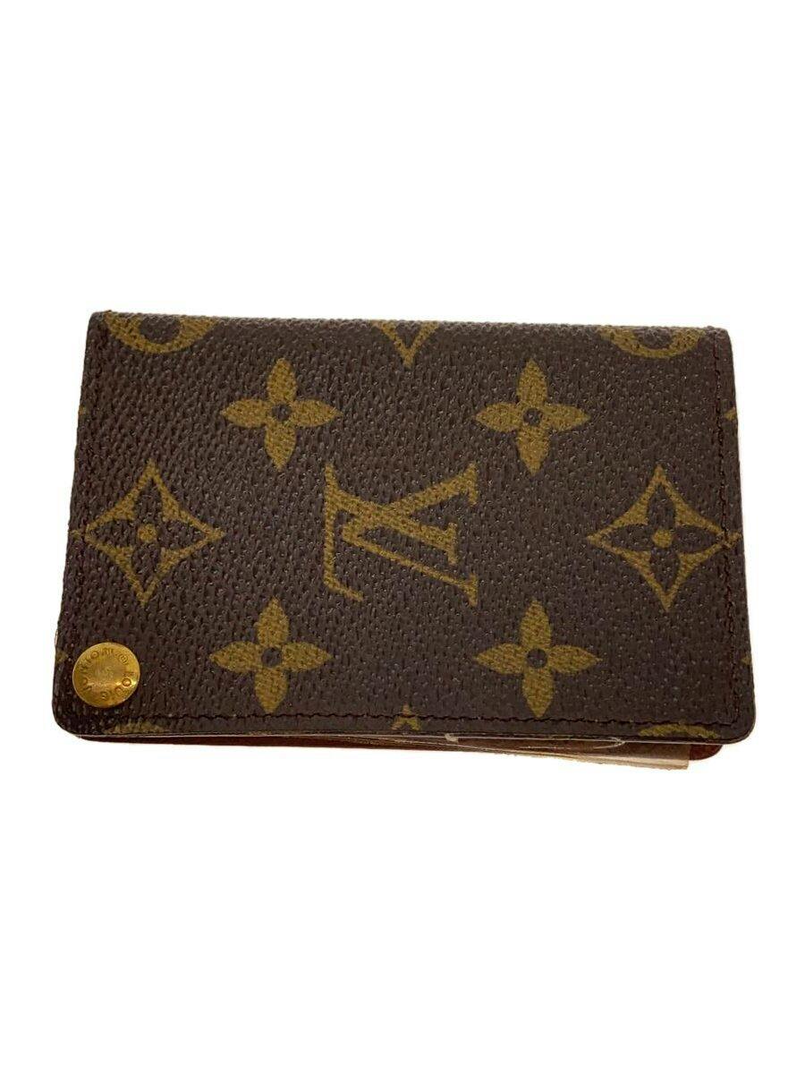 Closed brown Louis Vuitton monogram canvas card wallet showing the LV pattern and a gold snap button.