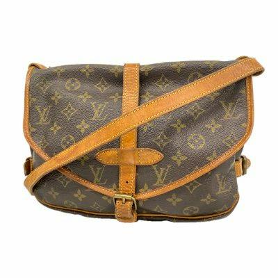 Front view of the LV Saumur 30 monogram canvas bag with cow leather trim and strap.