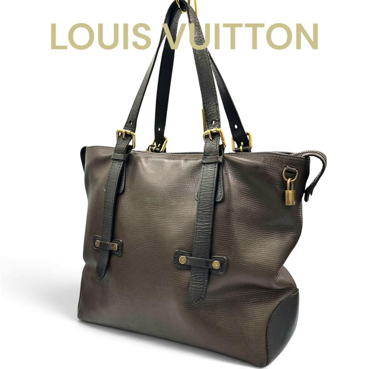 Brown Louis Vuitton leather tote bag with two shoulder straps and a visible padlock, shown on a white background.