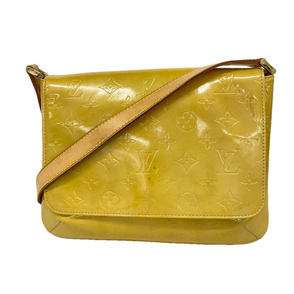Beige Louis Vuitton Vernis Thompson Street shoulder bag (M91008) showing the front flap with embossed monogram and leather shoulder strap.