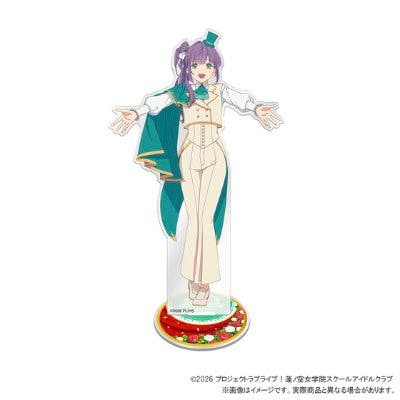 Acrylic stand showing a full-body anime school idol character in a teal and cream outfit standing on a round decorative base.