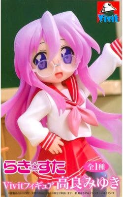 Photo of the Vivit plastic figure of Takara Miyuki from "Lucky Star" wearing a white-and-pink sailor school uniform and glasses.