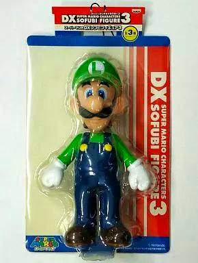 Packaged Luigi DX sofubi figure from Super Mario visible in blister card packaging.