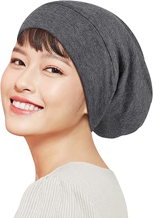 Model wearing a gray silk nightcap shown in a side view.