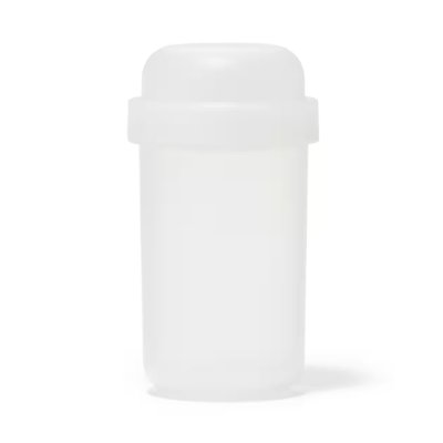 Translucent white plastic lunch capsule with a topping cup.
