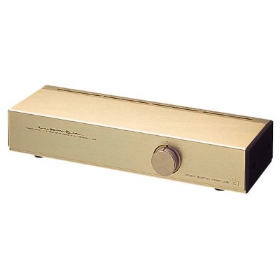 Front view of a gold LUXMAN AS-55 speaker selector switch with a central knob.