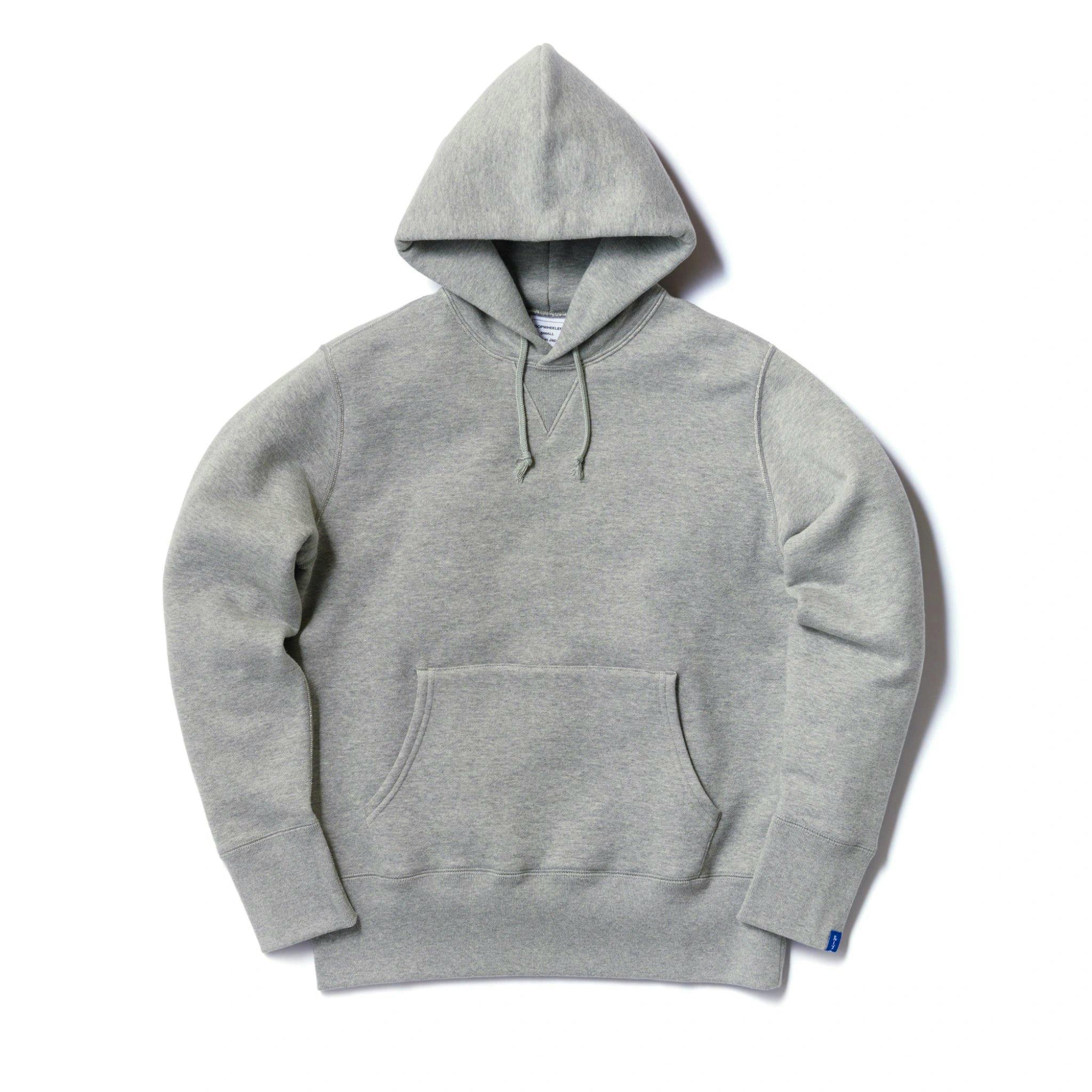 Gray melange tubular pullover hoodie laid flat showing the hood with drawstrings, kangaroo pocket, and ribbed cuffs and hem.