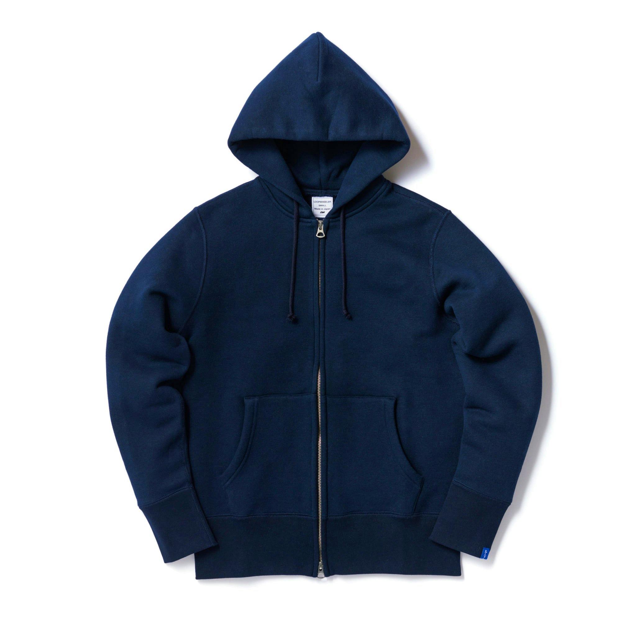 Flat-lay of the LW09 Tubular Zipper Hoodie - LW Navy showing the hood, front zipper, kangaroo pockets, and sleeves.