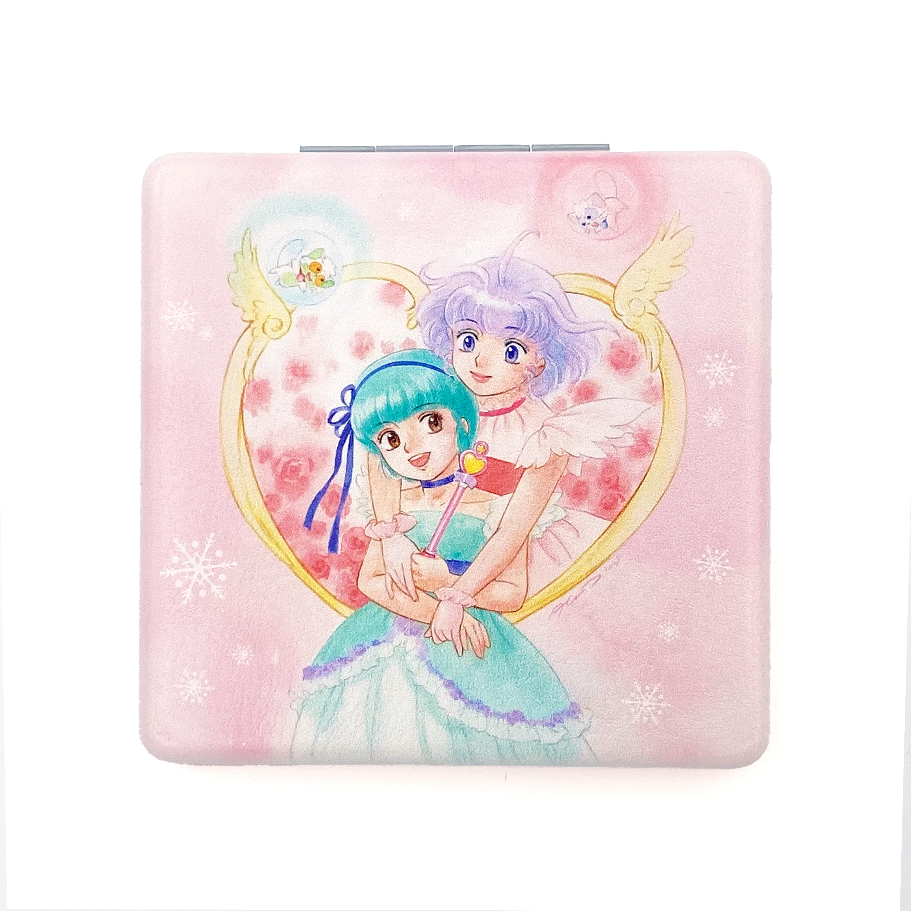 Closed compact mirror featuring Creamy Xmas 2025 artwork of two characters from Magical Angel Creamy Mami on a pink background.