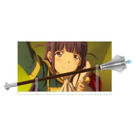 A decorative acrylic stand showing the anime character illustration with a metal object placed across the front.