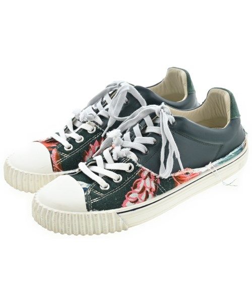 Maison Margiela men's sneakers with floral-patterned sides, white rubber toe caps, and white laces on a white background.