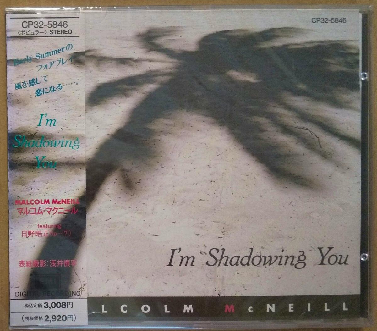 Front cover of the Malcolm McNeill CD "I'm Shadowing You" in its jewel case with obi strip, palm-shadow artwork, and catalog number CP32-5846.