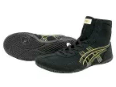 Two black Mamba polyester shoes, one showing a side view and the other showing the sole.
