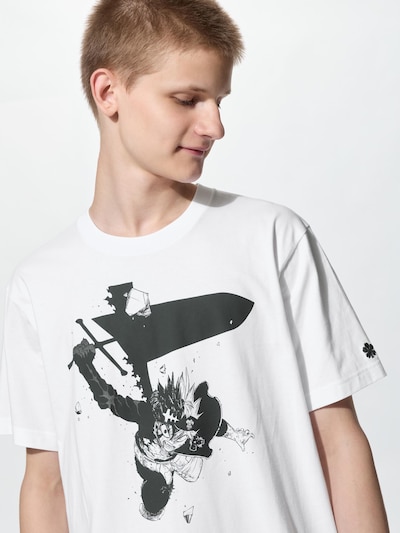 Model wearing a white cotton T-shirt with a large black Black Clover manga-style graphic on the front.