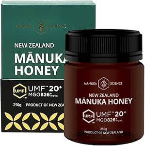 A jar of Manuka Science UMF 20+ Manuka honey (250 g) displayed next to its green and black product box.