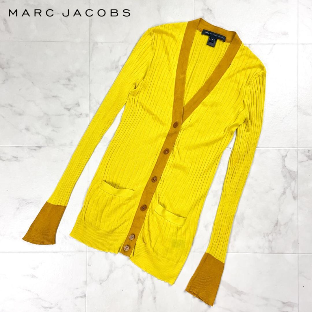 Yellow ribbed Marc by Marc Jacobs silk cardigan with contrasting trim, button-front pockets, and long sleeves laid flat.