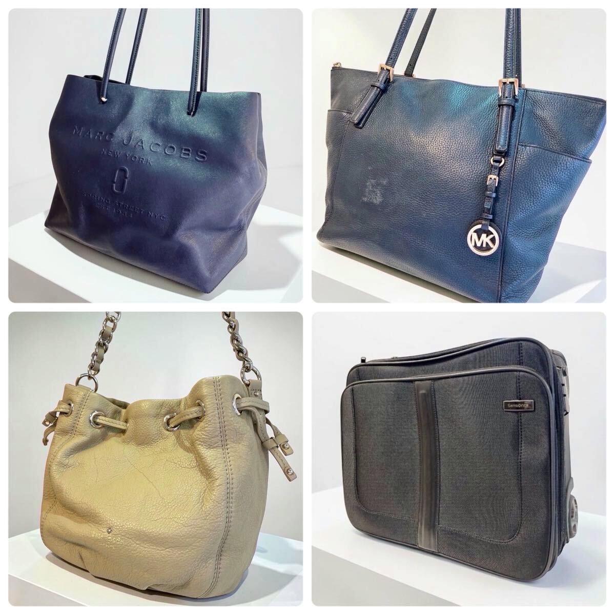 Four bags displayed together: a Marc Jacobs tote, a Michael Kors tote, a beige leather drawstring bag, and a black Samsonite rolling case.
